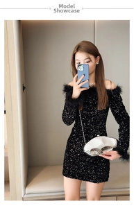 Detail of off-shoulder black sequin mini dress with elegant feather trim on sleeves