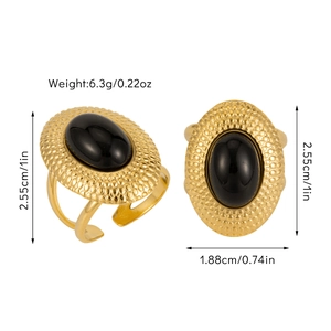 Detail view of oval black stone ring in gold metal showing dimensions and weight