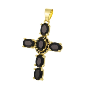 Detail view of a gold cross pendant with oval black gemstones and a central black stone