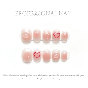 Macro detail of 10pcs short round press-on nails with 3D hearts and pink gradient