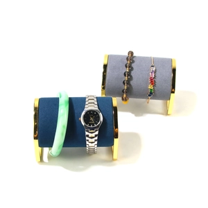 Velvet jewelry display stand with gold metal frame for watches and bracelets