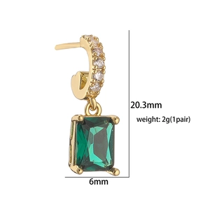 Detailed size view of gold emerald huggie earrings with dimensions and weight specs