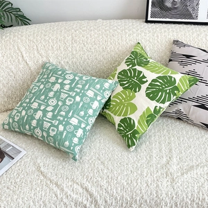 Modern cotton linen cushion covers with green leaf patterns and geometric prints