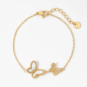 Elegant gold stainless steel butterfly bracelet with shell inlay and white crystals