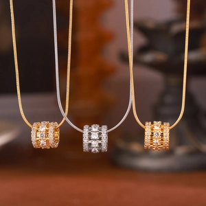Bohemian style cylinder pendant necklaces with white zircons on sleek snake chains
