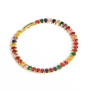 Detail of 18K gold plated bracelet with pear-cut multi-colored cubic zirconia gems