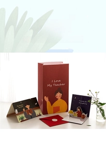 Close-up of Teacher Appreciation gift set with paper bag, cards, and envelope