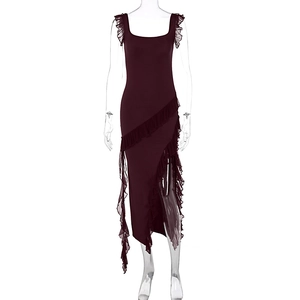 Detail of burgundy bodycon dress featuring ruffle trim and elegant side slit hemline