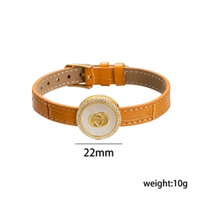 Orange bamboo pattern leather bracelet with gold clover double G medallion and crystals