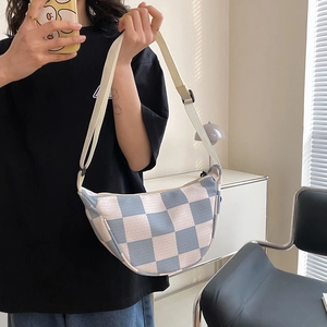 Hip hop crossbody bag with blue and white checkerboard pattern and waffle knit texture