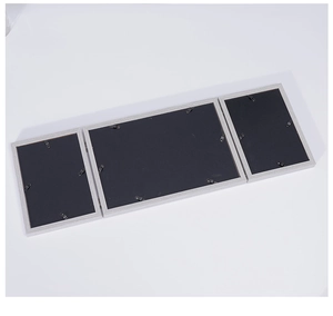 Detail of Nordic triple folding photo frame backboard with metal rotating clips and hinges