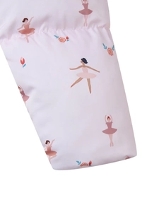 Detail of light pink sleeve cuff with ballet dancer and floral patterns on cotton jacket