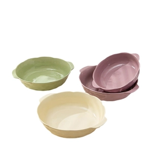 Three creamy pastel ceramic soup bowls with handles and elegant wave texture on white background