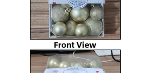 Front view of gold Christmas ball set featuring matte and glitter finishes in a clear box