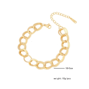 Detail of gold stainless steel beaded chain bracelet with lobster clasp and length marker