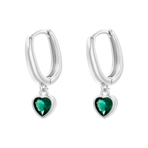 Detailed view of silver heart-shaped drop earrings featuring sparkling green crystals