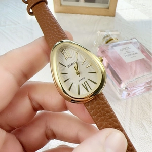 Vintage teardrop snakehead watch with brown leather strap and gold casing for women