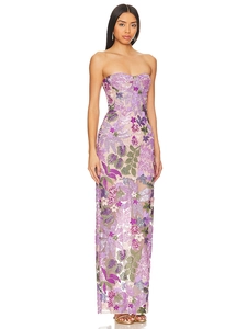 Detailed view of purple floral sequins and intricate embroidery on a mesh evening gown