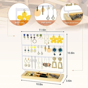 Detail view of wooden base and metal earring stand with 11.6x10.8 inch dimensions