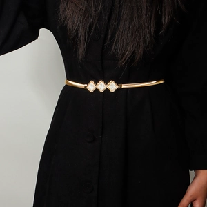 Elastic gold metal waist chain with three sparkling rhinestone heart accents for dresses