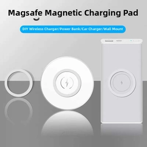 Detailed view of silver Magsafe magnetic ring sticker on power bank for wireless charging