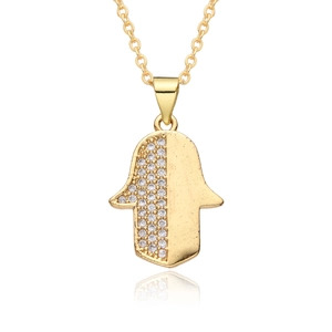 Golden Hamsa hand necklace with micro-pave cubic zirconia on a fine cross chain