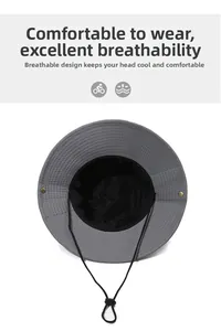 Detail of dark grey sun hat featuring mesh lining and adjustable chin strap