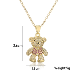 Detail showing dimensions of gold teddy bear pendant inlaid with sparkling zircons