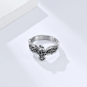 Macro view of Celtic eagle ring featuring intricate knotwork and vintage silver finish