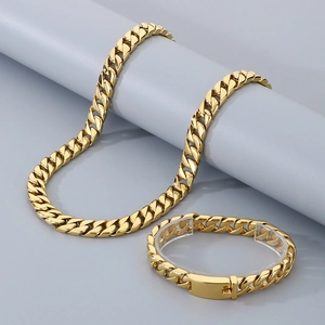 Classic 12mm golden Cuban link necklace and bracelet set in polished stainless steel