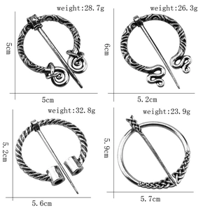Detailed dimensions and weights for four silver Celtic Viking brooches in metal alloy