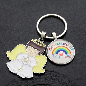 Rainbow metal keychain with an angel pendant and Schulkind lettering for school children
