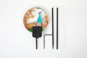 Solar garden lights kit featuring gnome and squirrel silhouettes on a colorful metal panel