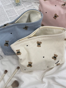 Corduroy bear cosmetic bags in white, blue, and pink colors with cute embroidery