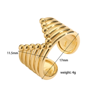 Detailed view of layered gold-plated ear cuff with small beads and 17mm width measurement