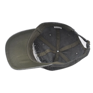 Internal view of olive green washed cotton baseball cap showing lining and metal buckle