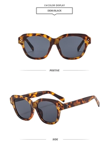 Detail view of tortoiseshell square sunglasses with triple metal rivets and dark lenses