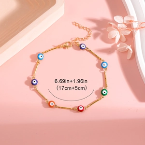 Detailed view of colorful evil eye bracelet with adjustable 17+5cm gold-plated chain