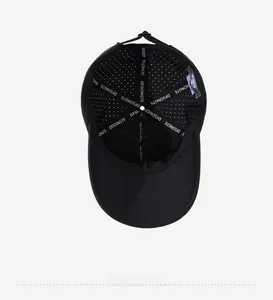 Detail of black breathable baseball cap interior with mesh vents and branded tape