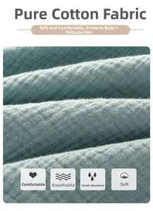 Detail of soft breathable pure cotton gauze fabric in dusty blue for baby onesie