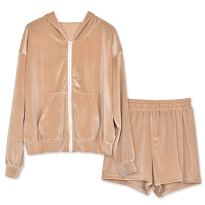 Detailed texture of champagne velvet hooded sweatshirt and matching drawstring shorts