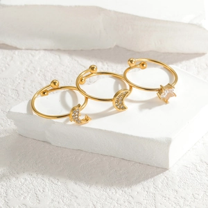 Elegant 18K gold-plated stainless steel celestial rings with moon and star zircon details