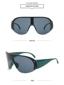 Detailed front and side view of oversized one-piece cycling sunglasses in green and blue gray