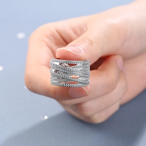 Silver multi-layer crossover wide ring with clear pave-set cubic zirconia stones