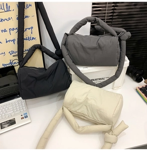 Detailed comparison of quilted nylon tote bags in black, dark grey, and creamy white colors