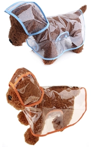Detail of transparent PVC pet raincoat with hood and colored borders for small dogs