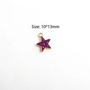 Detail of a purple star-shaped alloy pendant with gold edges, size 10x13mm