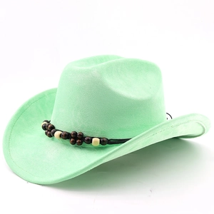 Detail of mint green suede cowboy hat with bohemian wooden bead decorative band