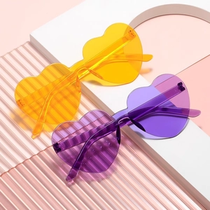 Retro heart shaped rimless sunglasses in yellow and purple colors for women party fashion