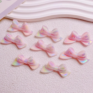 Luminous gradient pink iridescent bow beads for DIY phone chains and keychains